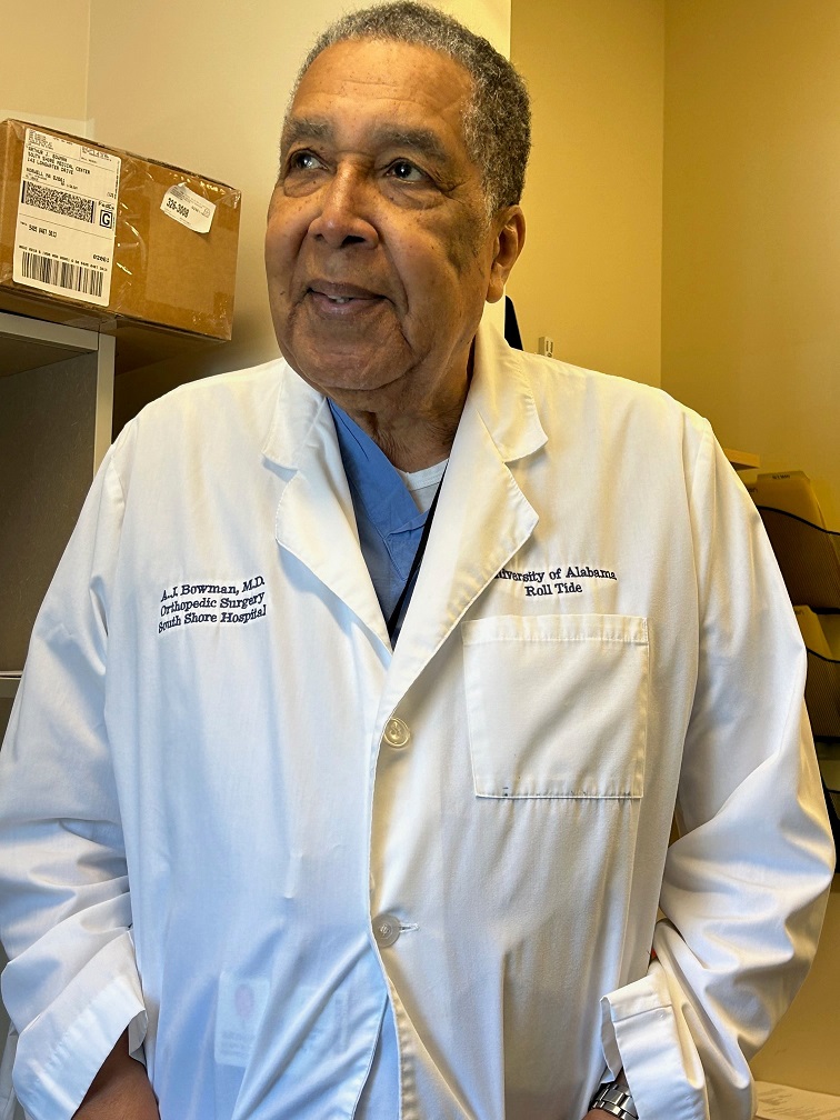 Dr. Arthur Bowman in lab coat