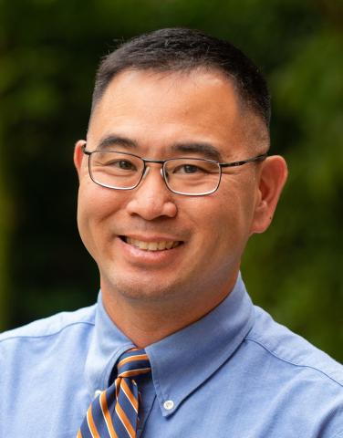 Headshot of Ricky Kue, MD, MPH