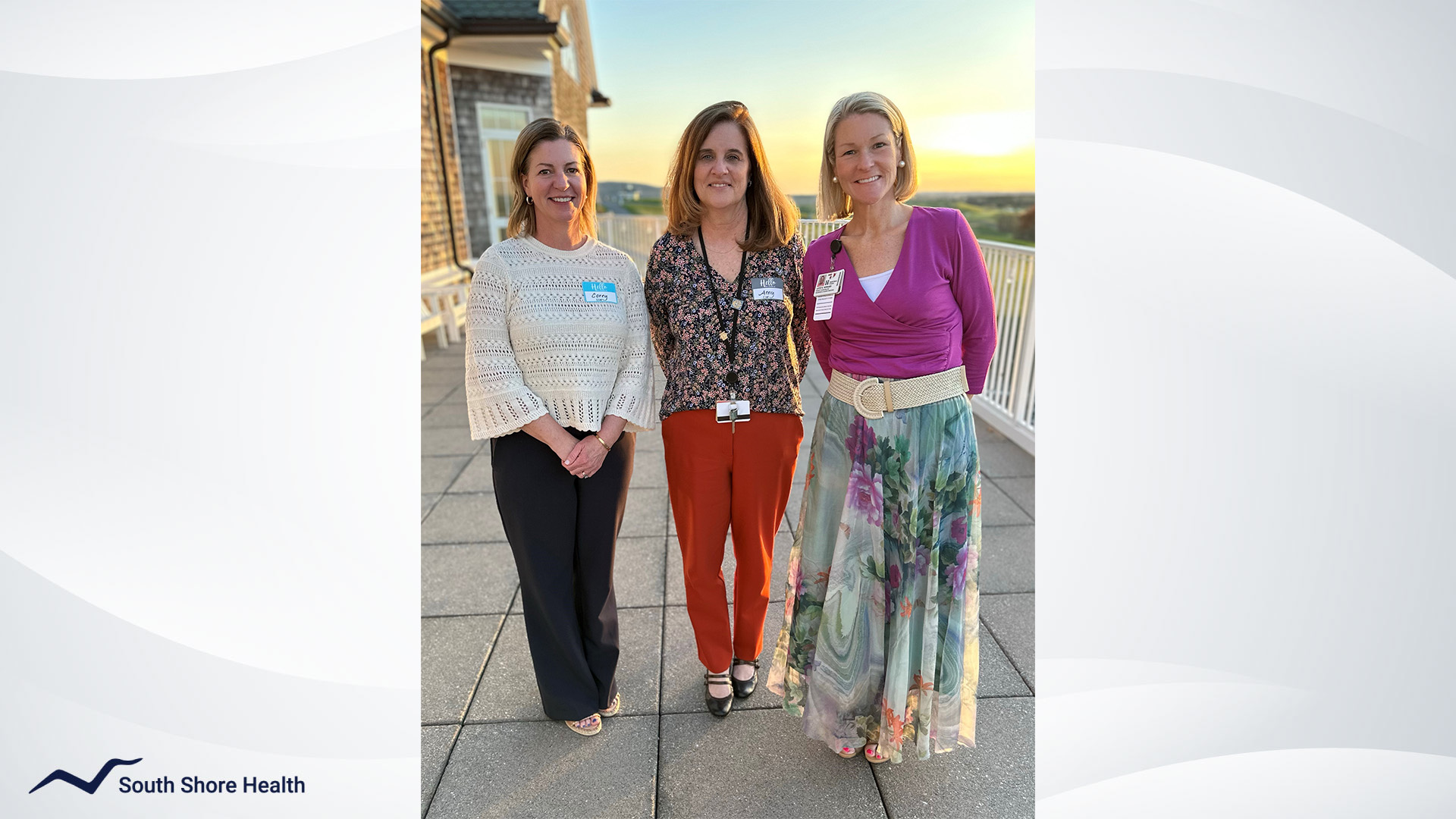 Corey, Amy, and Katie of South Shore Health pose for a photo on the patio at Granite Links after the Volunteer Appreciation Dinner.