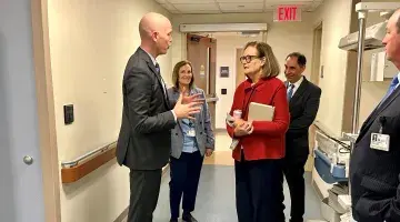 Dr. Jason Tracy gives DPH Secretary Kate Walsh a tour of South Shore Health's Emergency Department 