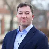 Professional headshot of Feliks Reikhrud of South Shore Health