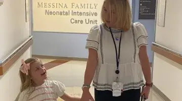 Georgia Bowen, 7, meets Beth Brooks, RN to tour NICU
