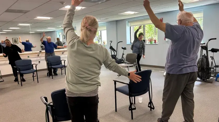 A group of seniors in an exercise class
