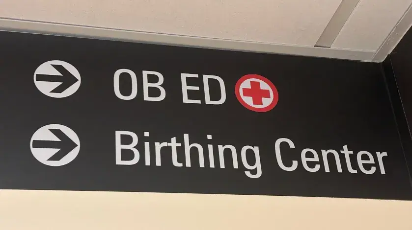 A sign for the obstetrics emergency department at South Shore Hospital