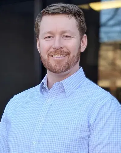 Headshot of hand therapist and occupational therapist Roger Cufaude of South Shore Health